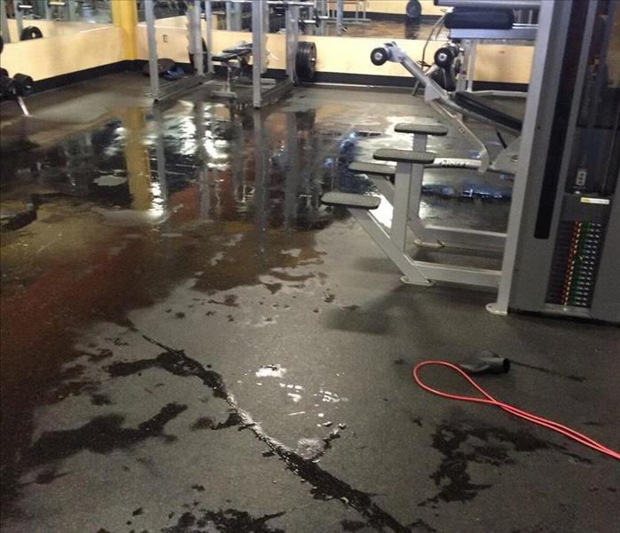 standing water on floor of gym